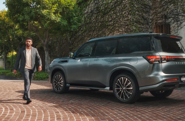 Owner walking away from a QX80