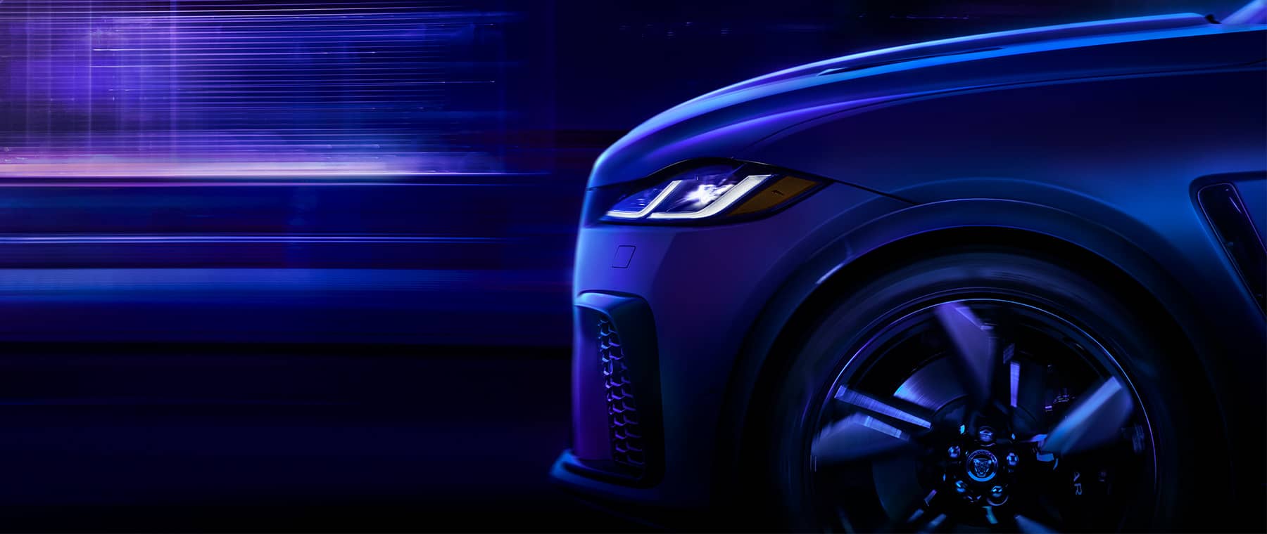 2024 Jaguar vehicle front side view dark