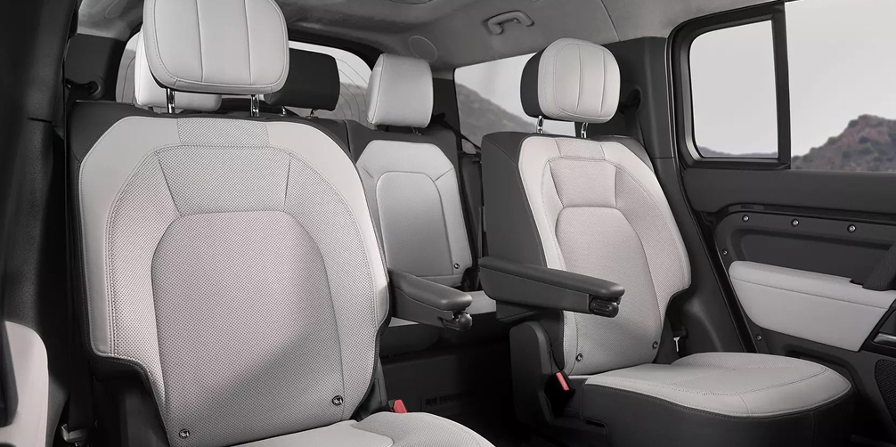 Defender 130 interior view of the front and back seats