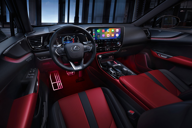 Wide-angled interior view of a Lexus front seats and dashboard
