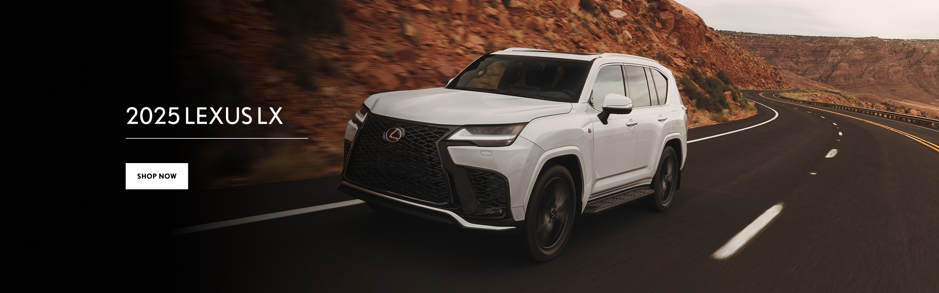 2025 White Lexus LX driving on a winding mountain road