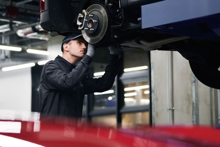 Mechanic fixing car