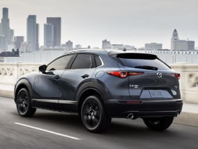 2022 Mazda CX-30 driving into the city