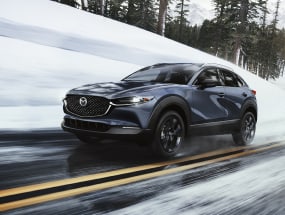 2022 Mazda CX-30 driving in snow