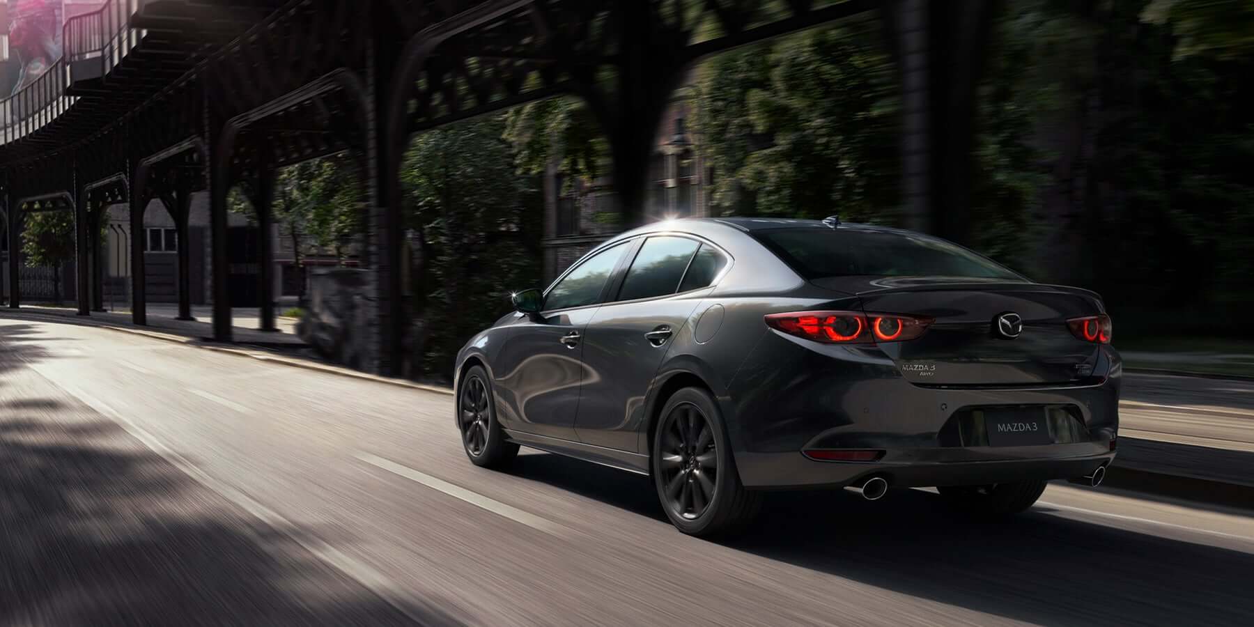 2022 Mazda3 Seadan driving down road