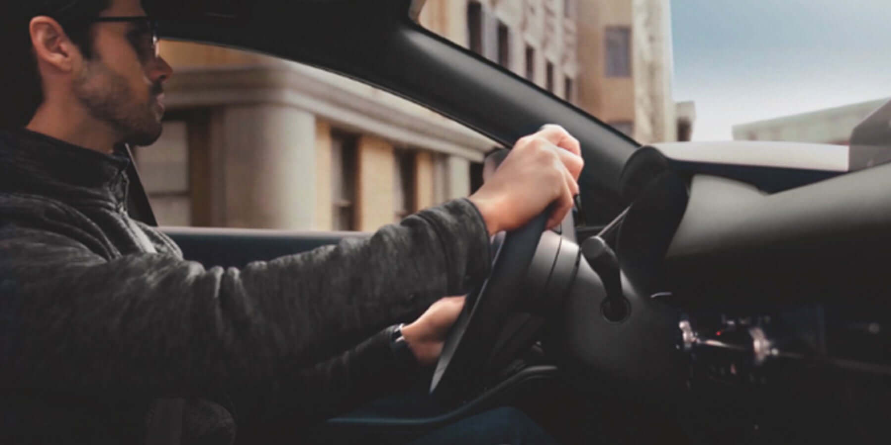 Man driving Mazda