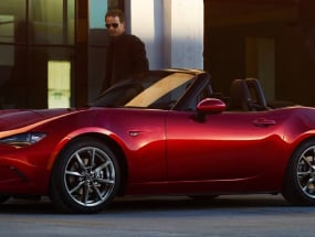 MX-5 Miata parked on a city street