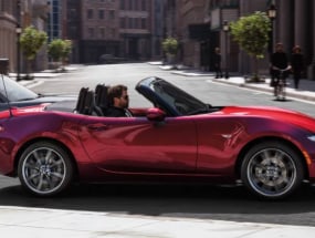 2022 Mazda MX-6 Miata driving in the city