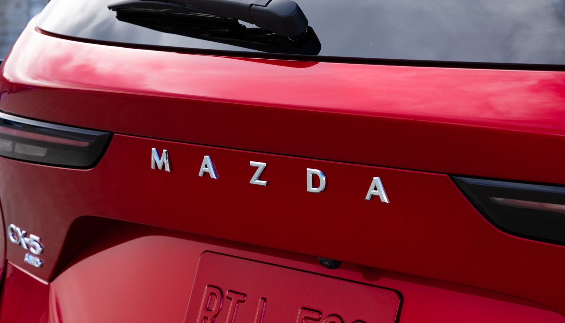Mazda badge on the rear hatch of a CX-5