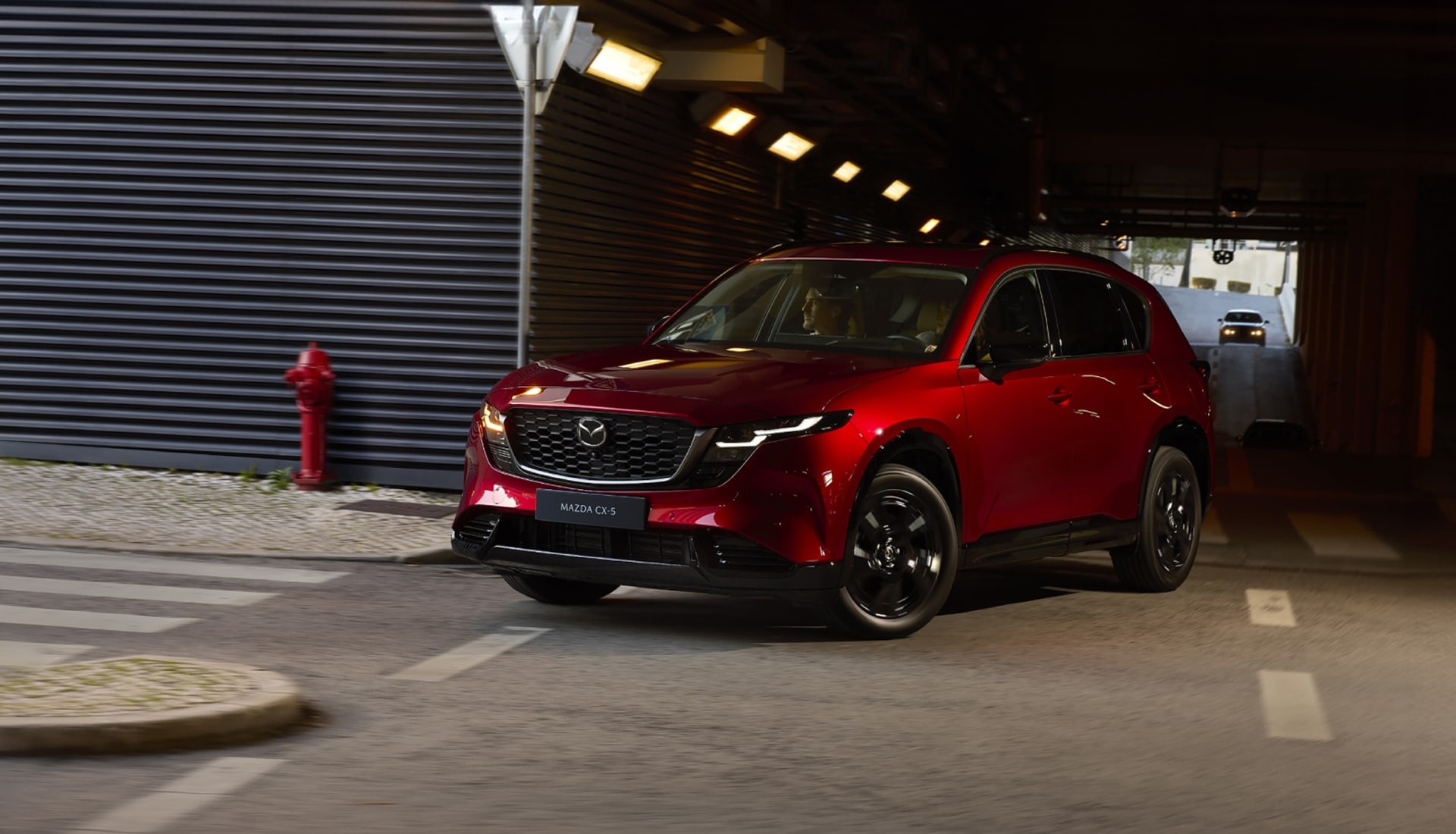 2026 Mazda CX-5 turning on a city street