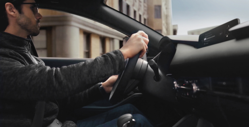 man driving a 2026 Mazda3 Sedan