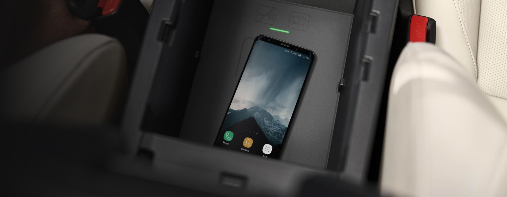 smartphone charging wirelessly in a Mazda3 Sedan