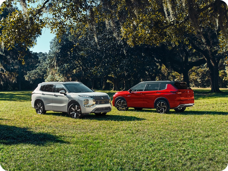 Two Mitsubishi SUVs