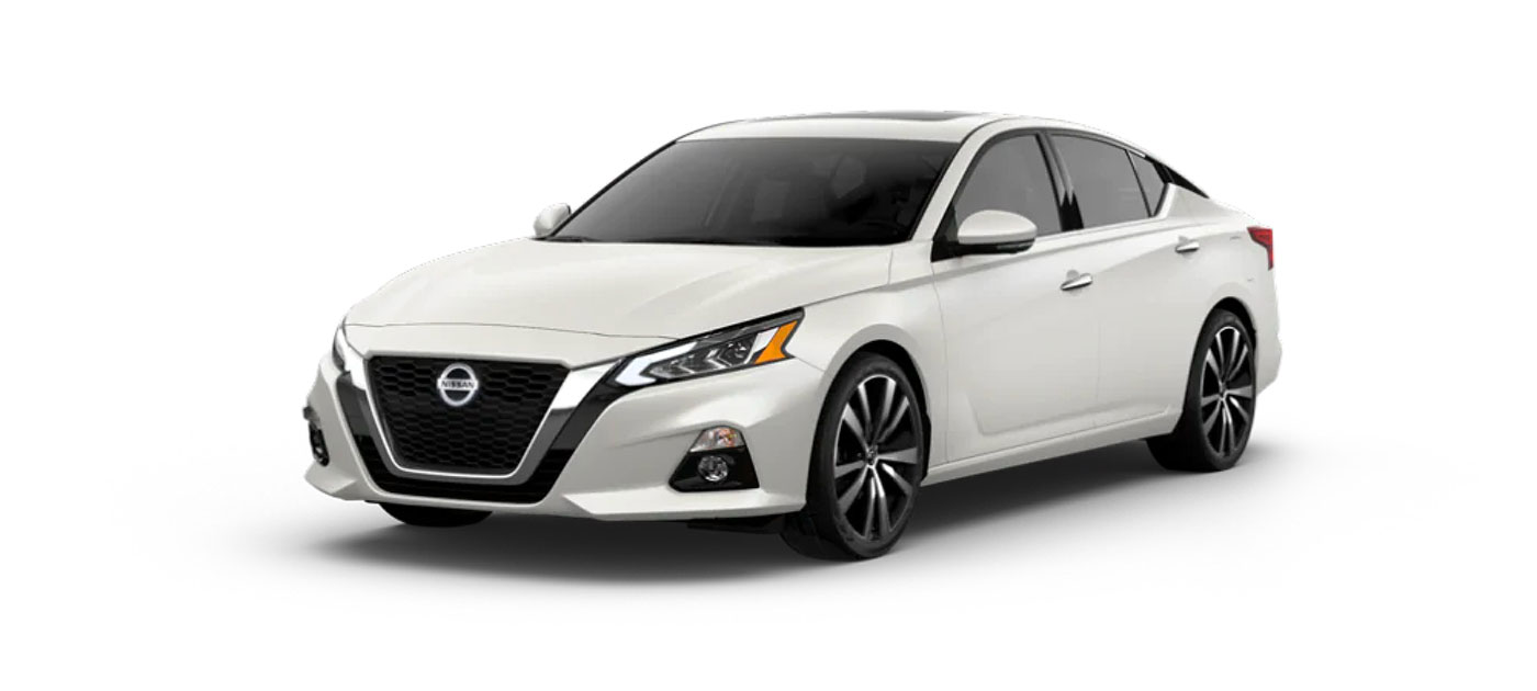 Pearl White TriCoat Nissan Sedan