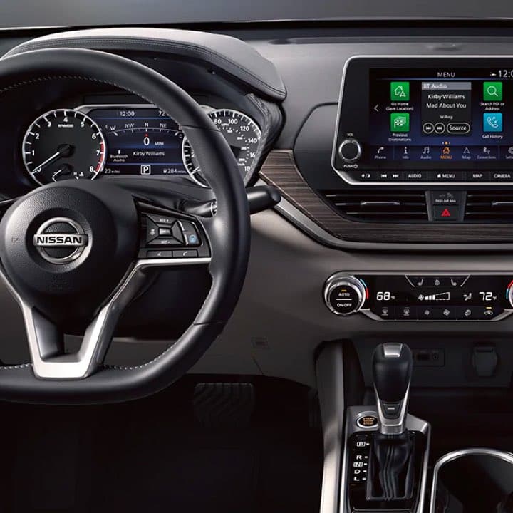 View of steering wheel, dashboard and console