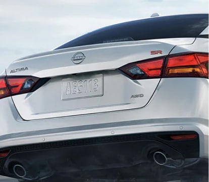 Rear-end of white nissan altima