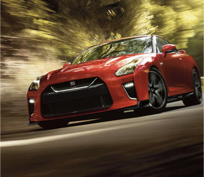Red GT-R driving toward the camera
