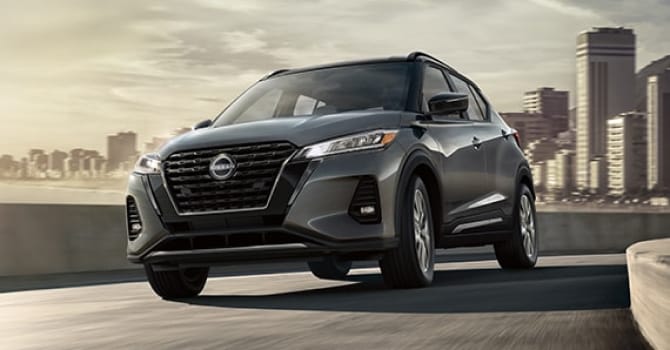 Front view of Nissan Kicks driving on road