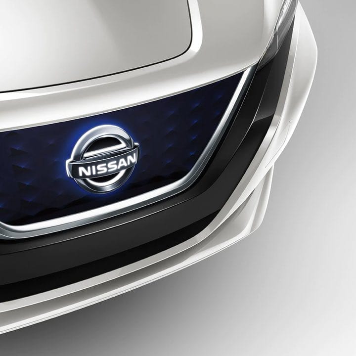 2021 Nissan LEAF front grill and glowing Nissan logo