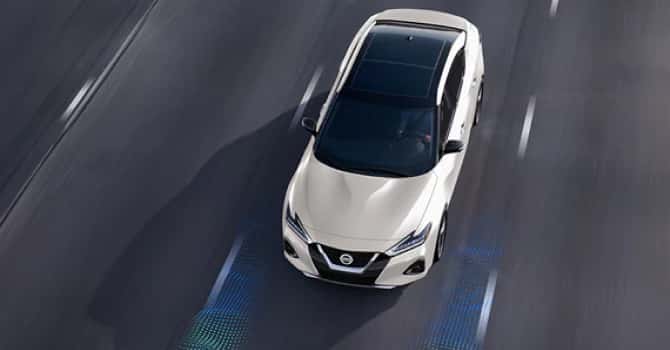 White Nissan Maxima aerial view
