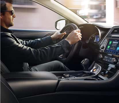 Man with sunglasses driving