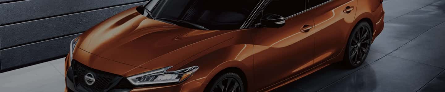 Orange Nissan Maxima