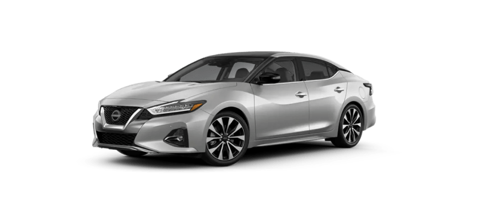 Brilliant Silver Metallic Nissan Sedan