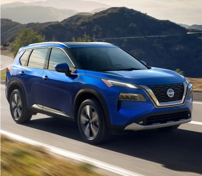 Front view of blue Nissan vehicle