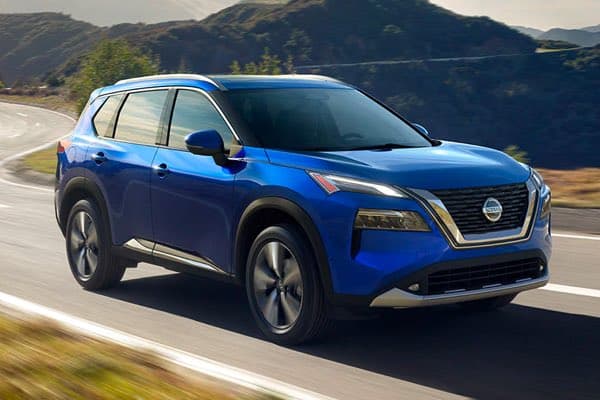 Nissan Rogue driving on a road