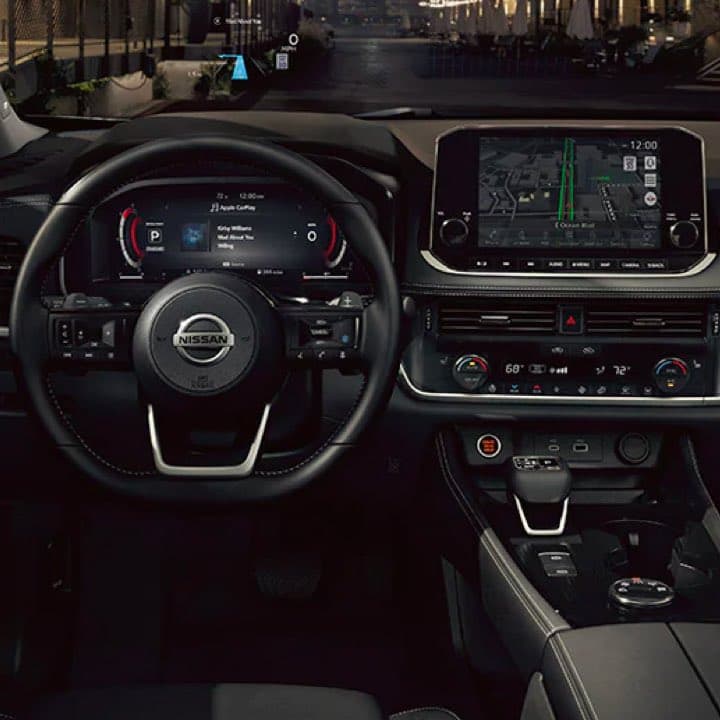 Detail picture showing the Steering wheel, interactive digital display, and console
