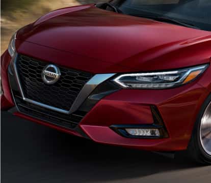 Red Nissan Sentra grill and headlights