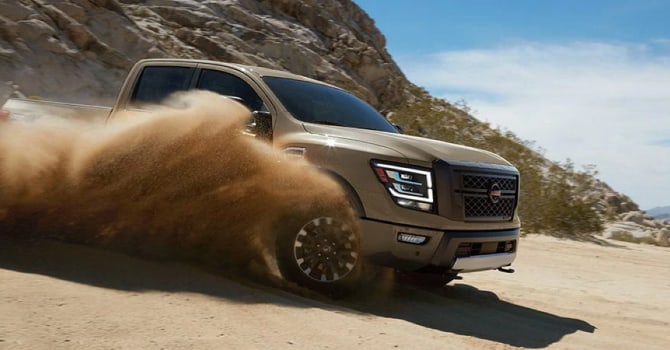 2022 Nissan Titan XD off-roading on a beach