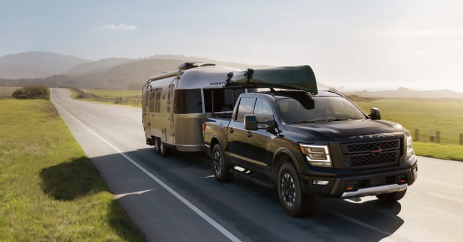 2022 Nissan Titan XD towing a camper