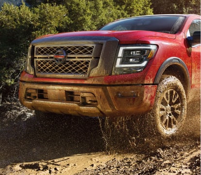 Nissan Titan offroading in mud