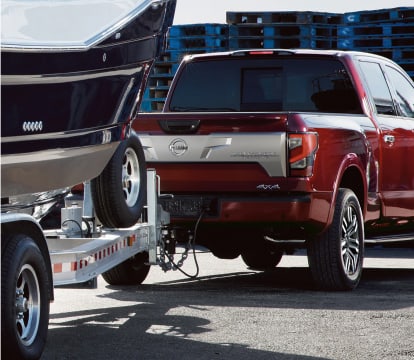Nissan Titan towing a boat trailer