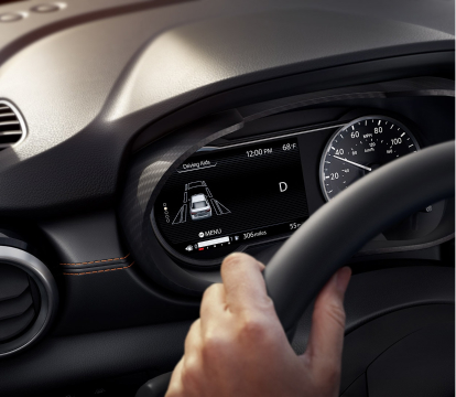 Close-up of vehicle steering wheel and dashboard