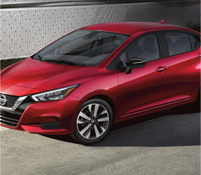 Three quarter view of red Nisasn Versa