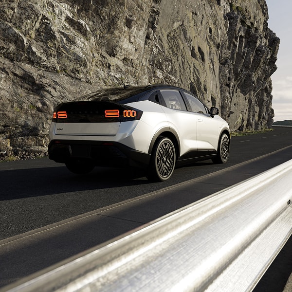 Nissan Leaf driving on a mountain highway