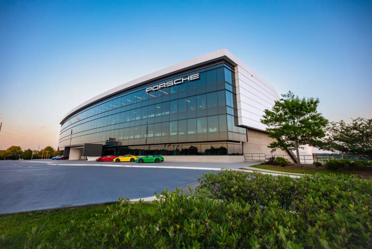 Exterior shot of a modern Porsche dealership