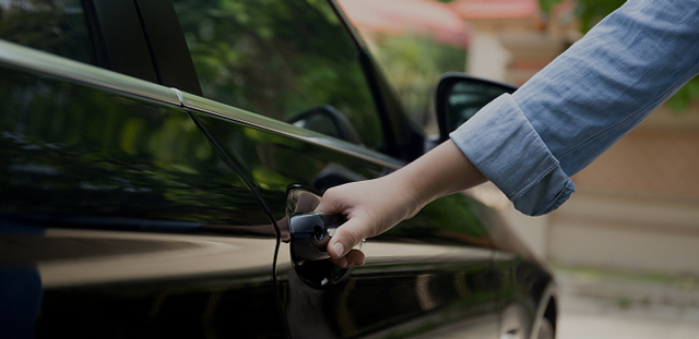 Driver opening their car door