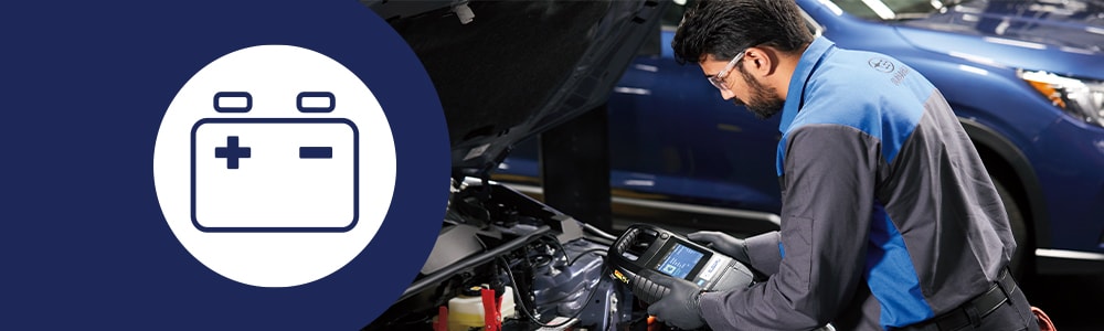 Subaru technician testing battery health
