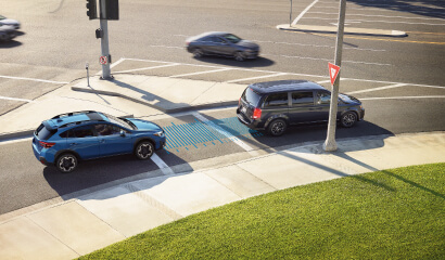 A photo illustration showing the Adaptive Cruise Control with Lane Centering feature on the 2023 Crosstrek Hybrid.