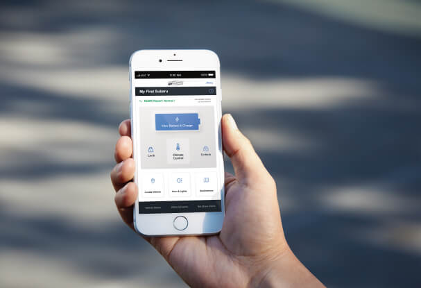 A close-up of a smartphone showing the available Remote Services feature on the 2023 Crosstrek Hybrid.
