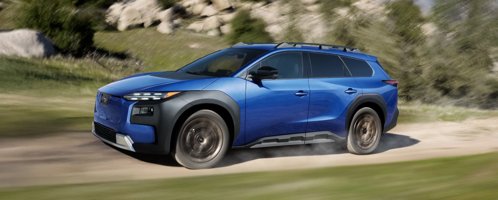 2026 Subaru driving in rocky, mountainous terrain