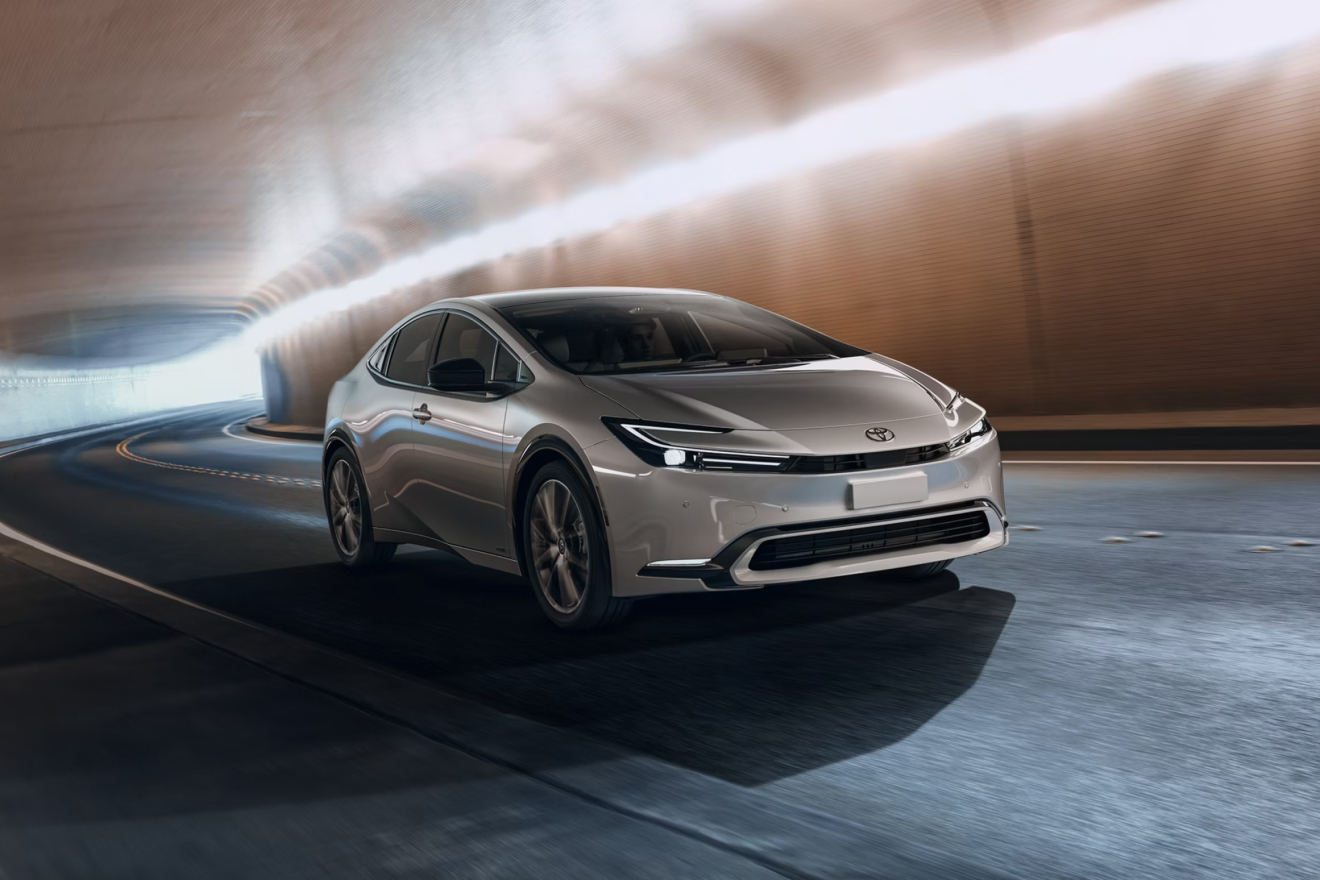 2027 Prius driving towards viewer in underground tunnel