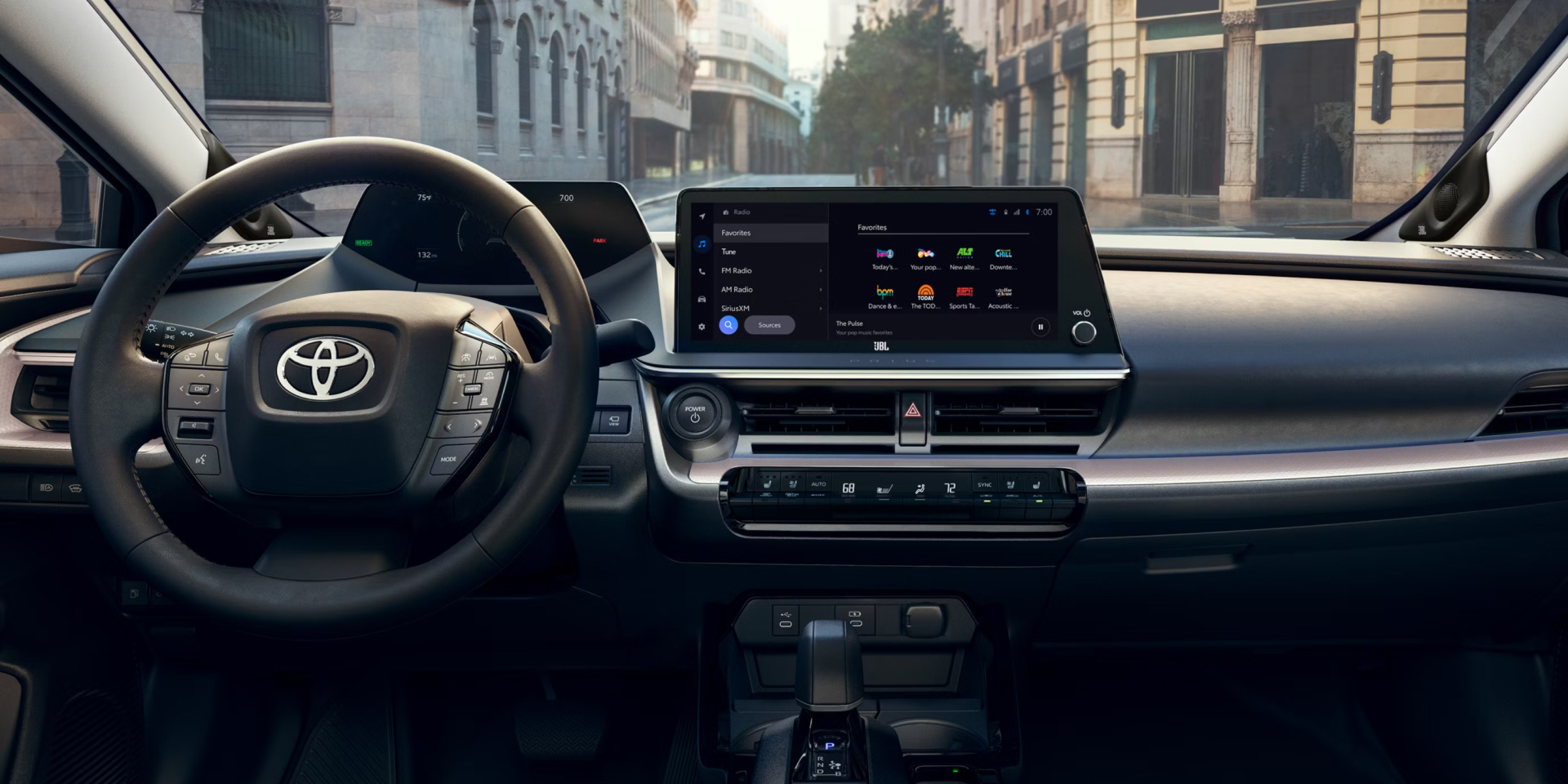 Interior shot showing steering column, dashboard and digital display