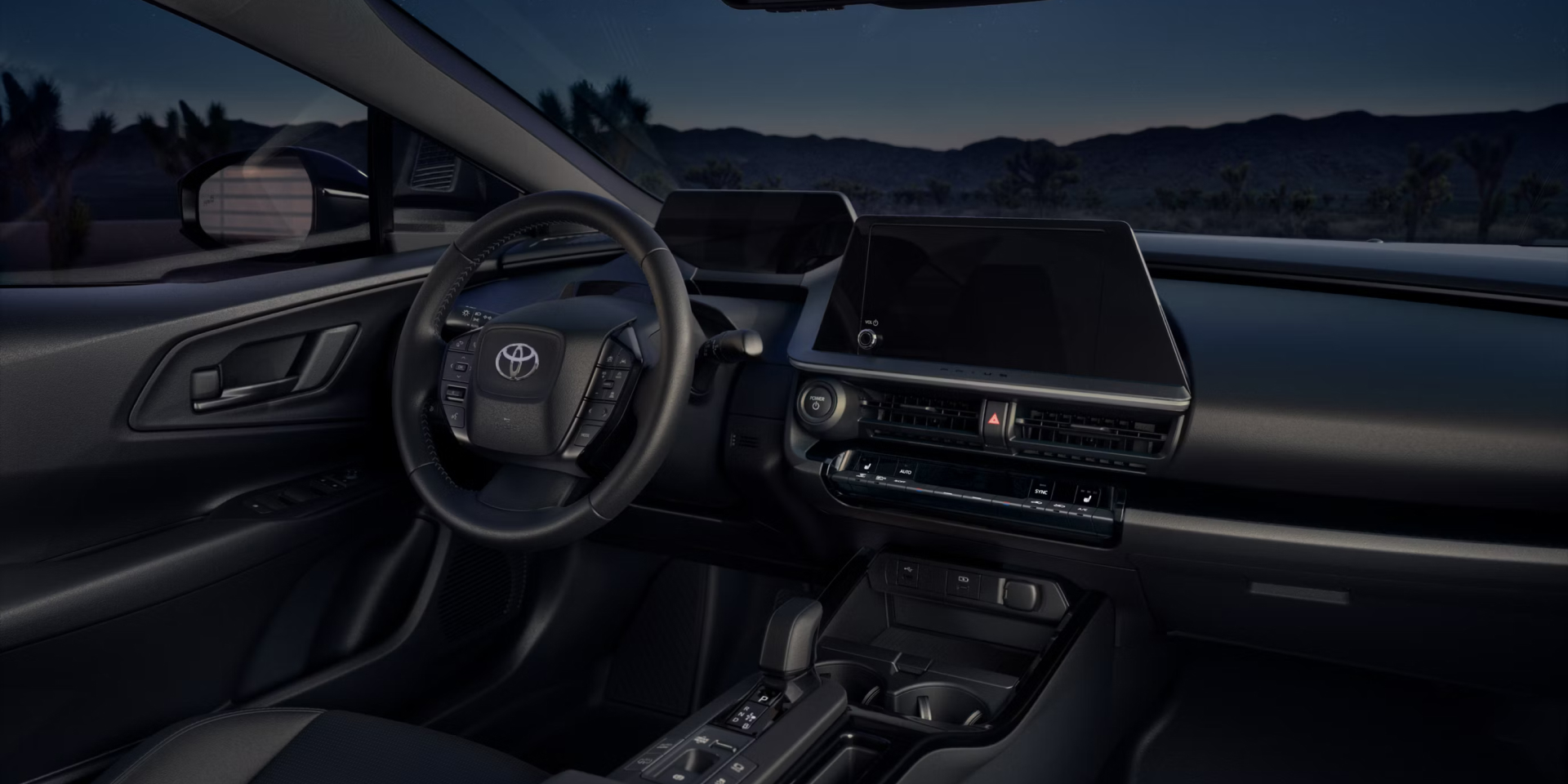 Interior shot showing steering column, dashboard and digital display