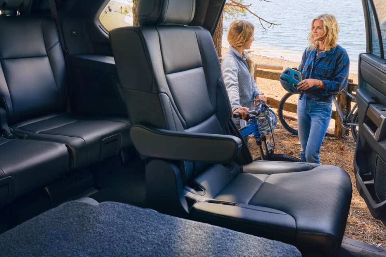 Toyota Sequoia power third-row seats and cargo system folded for hauling gear