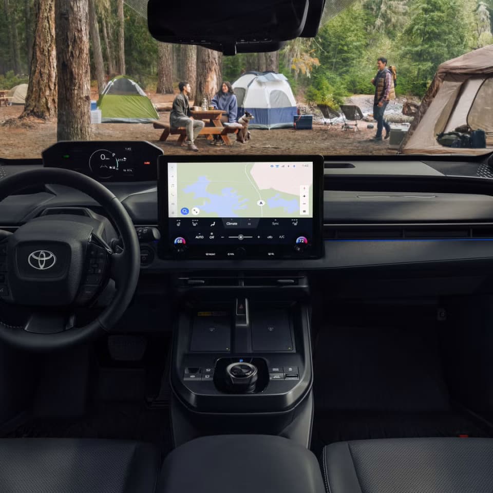 2027 Toyota bZ Woodland interior with steering wheel and touchscreen display
