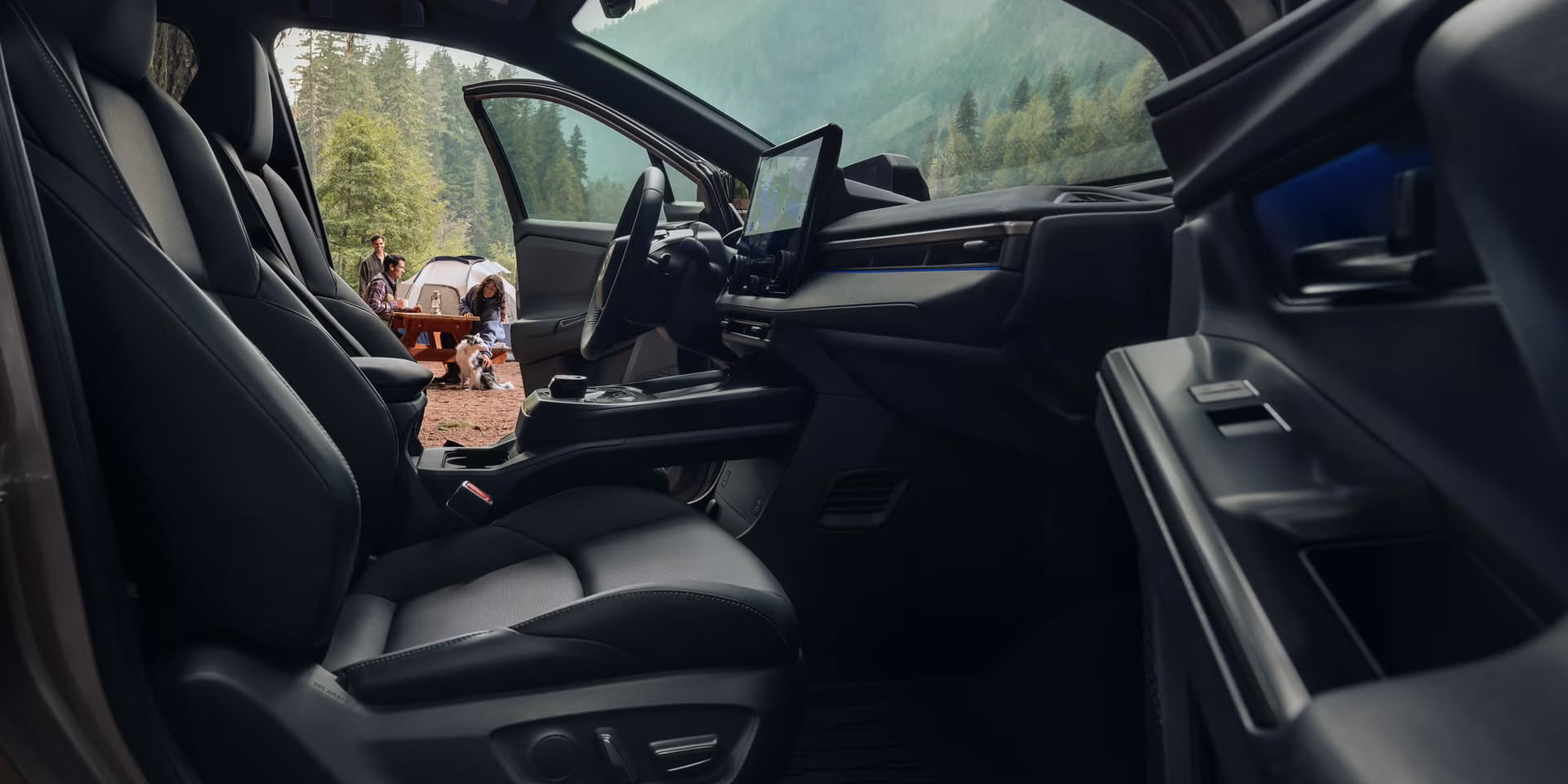 2027 Toyota bZ Woodland front interior with black seats and spacious cabin